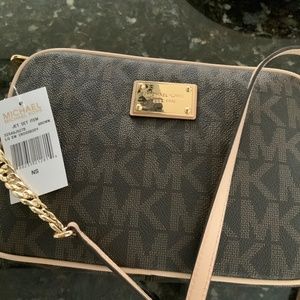Michael Kors hand bag never used or opened. NWT.